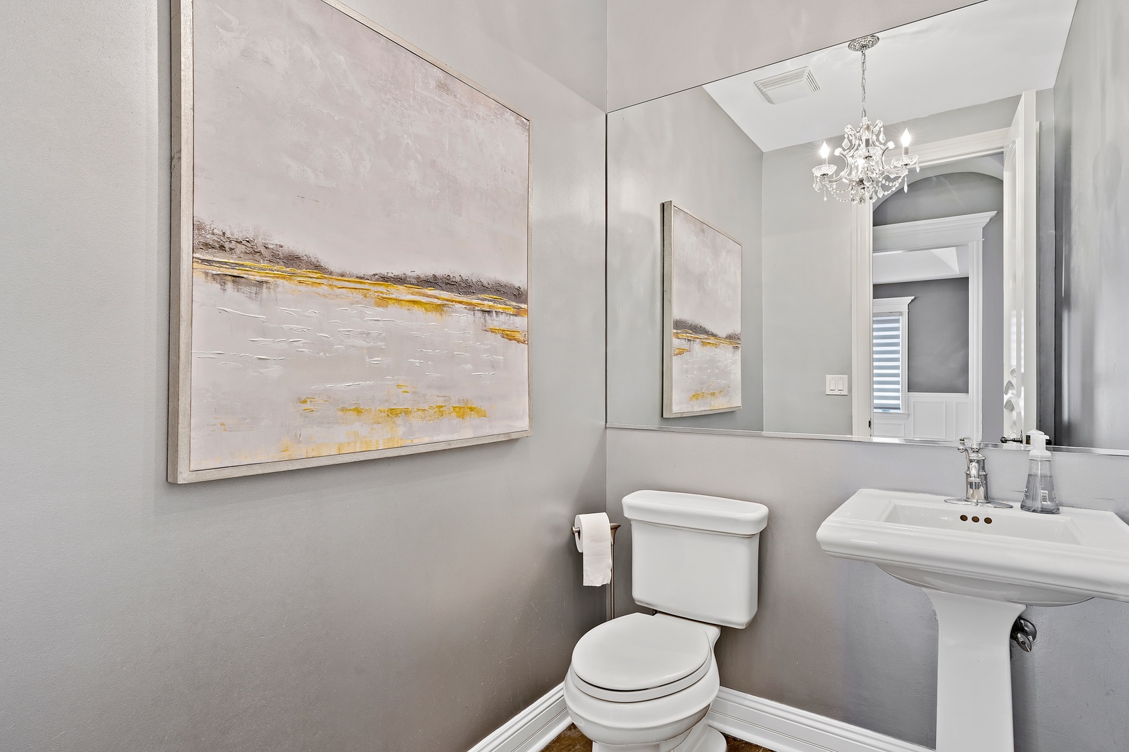 3151 Keystone Road Northbrook, IL 60062 - Photo 12 of 48 a bathroom with a toilet a sink and mirror