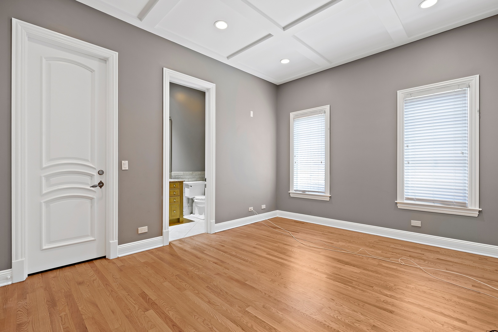 3151 Keystone Road Northbrook, IL 60062 - Photo 13 of 48 a view of an empty room with wooden floor and a window