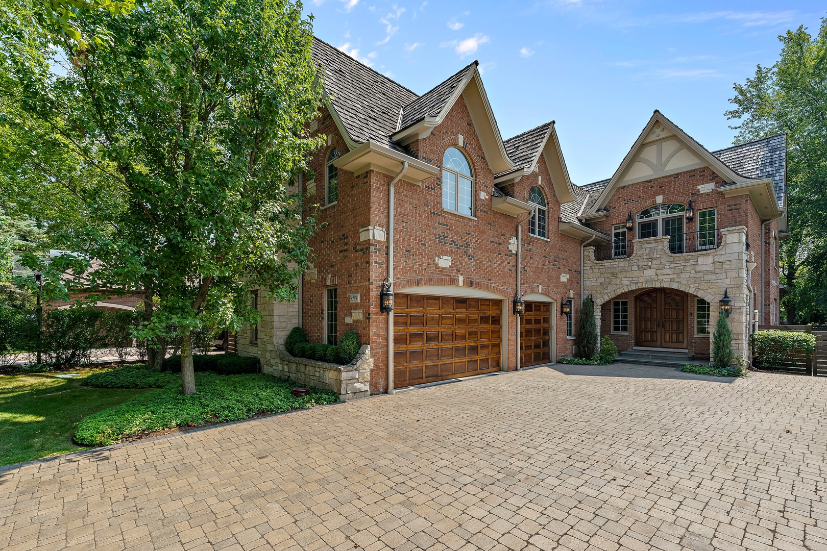 3151 Keystone Road Northbrook, IL 60062 - Photo 40 of 48 a front view of a house with garden