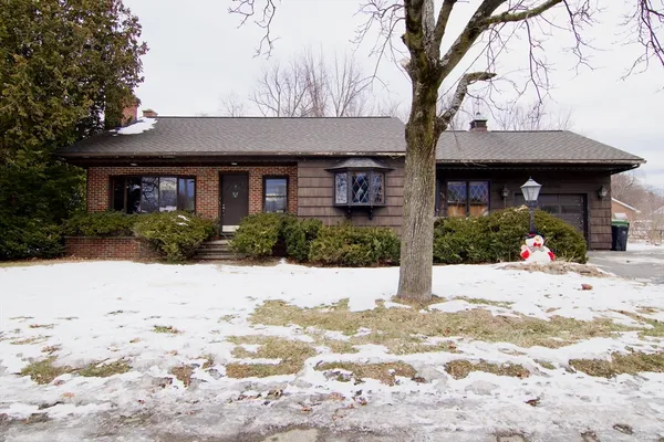 a front view of house with yard