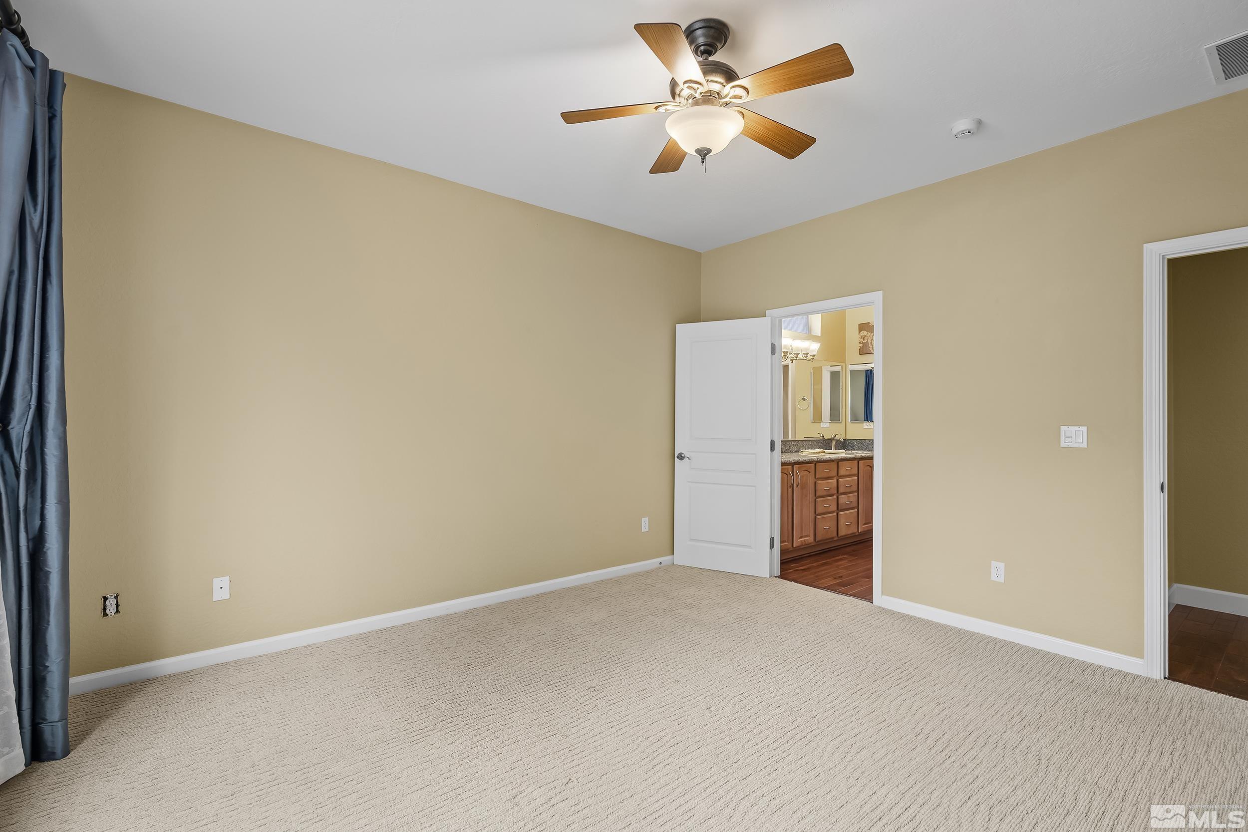 1745 Trail Creek Way Reno, NV 89523 - Photo 17 of 28 wooden floor in an empty room