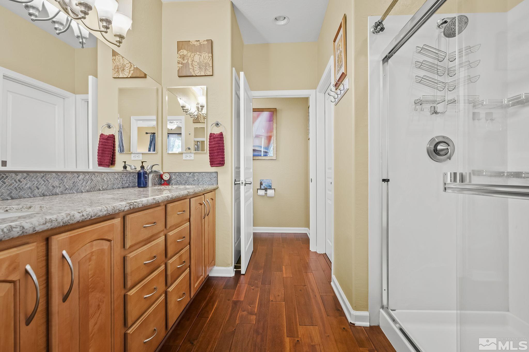 1745 Trail Creek Way Reno, NV 89523 - Photo 18 of 28 a bathroom with a sink and a mirror