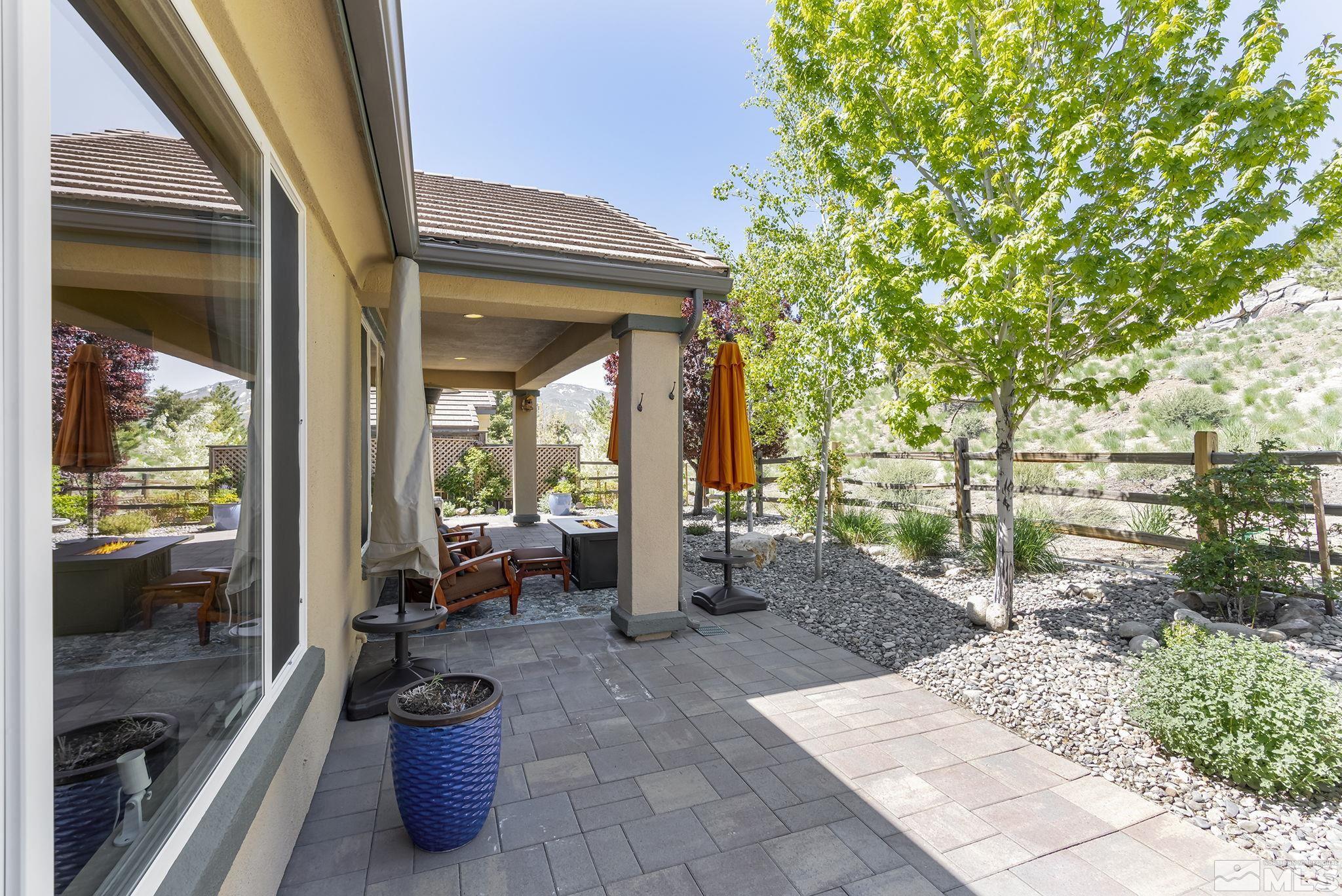 1745 Trail Creek Way Reno, NV 89523 - Photo 23 of 28 a view of a patio with chairs and potted plants