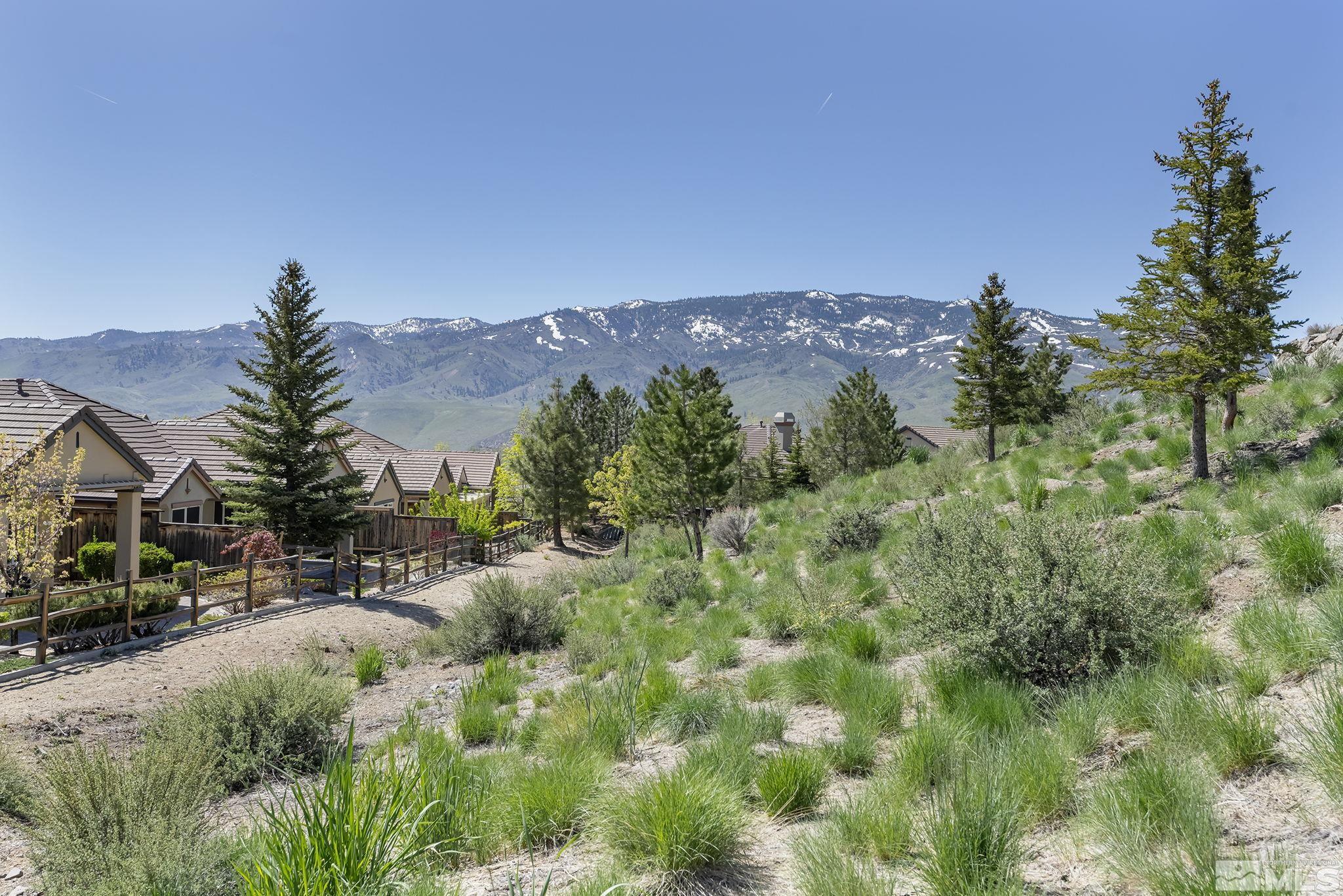 1745 Trail Creek Way Reno, NV 89523 - Photo 28 of 28 a view of a house with a mountain in the background