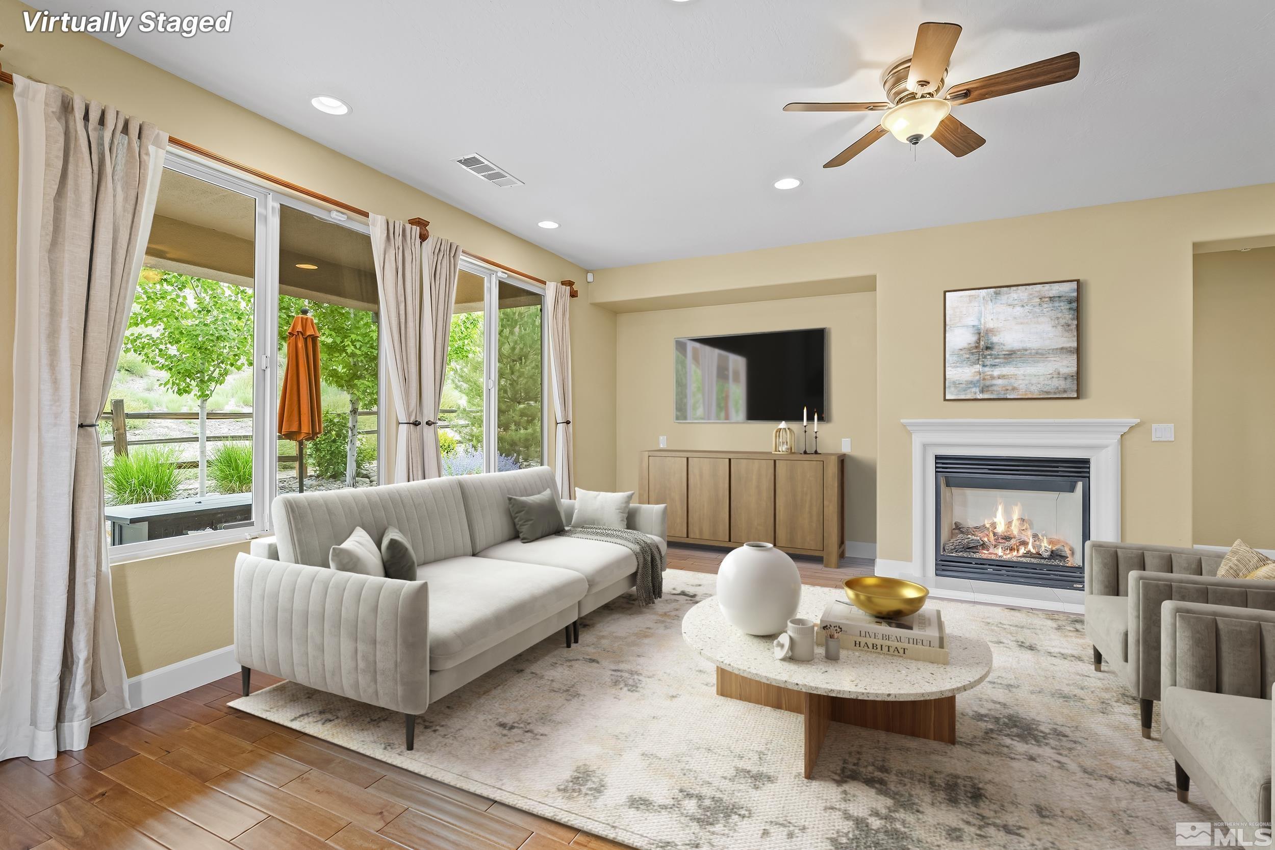 1745 Trail Creek Way Reno, NV 89523 - Photo 6 of 28 a living room with furniture and a fireplace