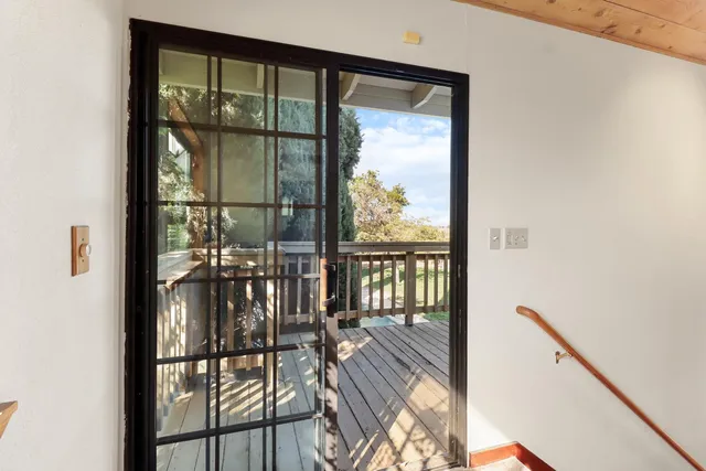a view of swimming pool with outdoor seating and plants