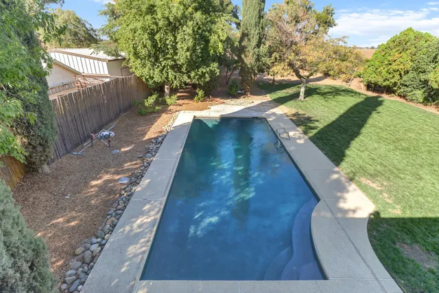 a view of a house with a swimming pool