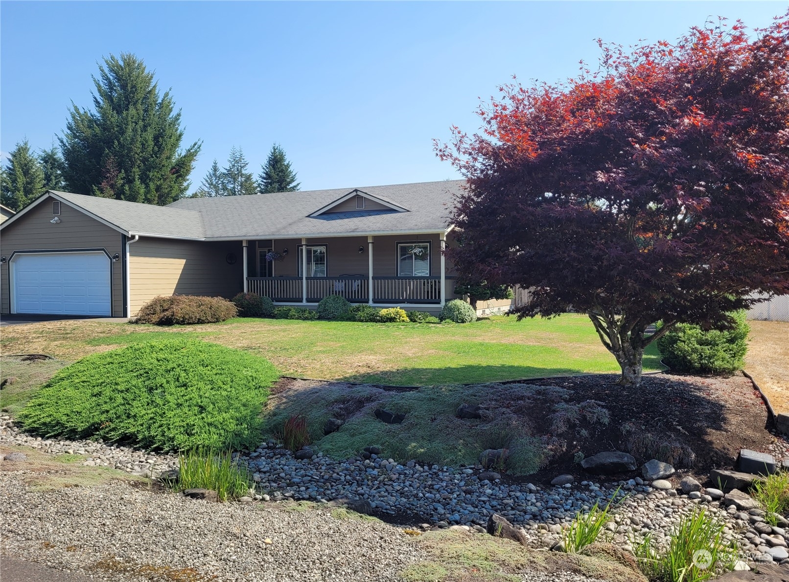 17330 Privet Court Southwest Rochester, WA 98579 - Photo 1 of 25 a house with swimming pool in front of it