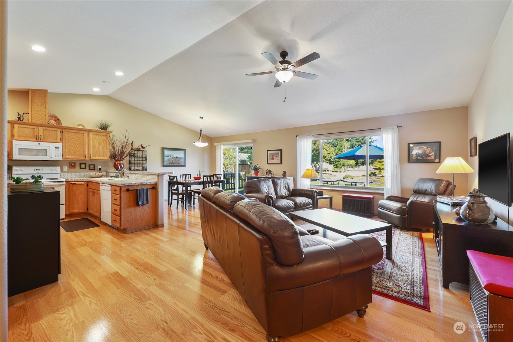 17330 Privet Court Southwest Rochester, WA 98579 - Photo 11 of 25 a living room with furniture kitchen area and a window