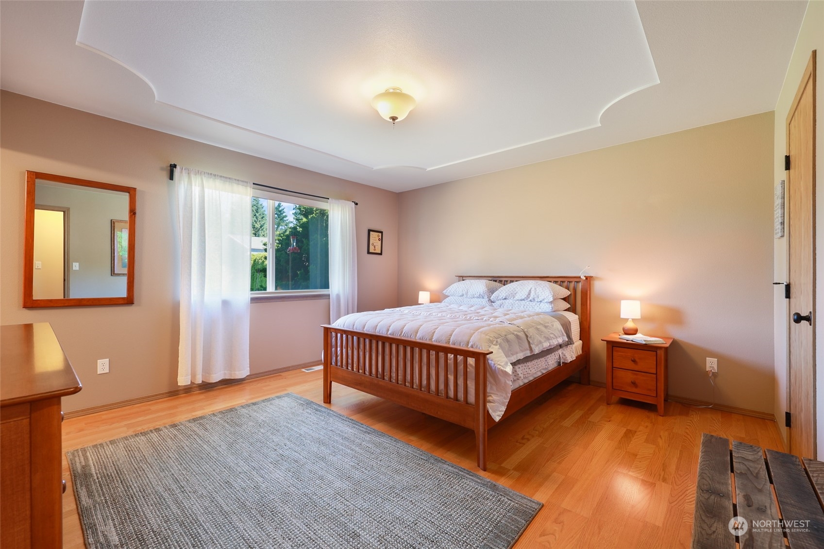 17330 Privet Court Southwest Rochester, WA 98579 - Photo 19 of 25 a bedroom with a bed and window