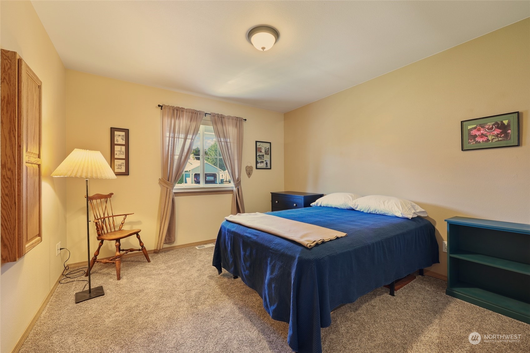 17330 Privet Court Southwest Rochester, WA 98579 - Photo 24 of 25 a bedroom with a bed and a table in it