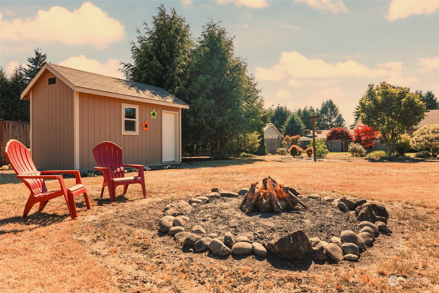 17330 Privet Court Southwest Rochester, WA 98579 - Photo 8 of 25 a view of a backyard with a patio