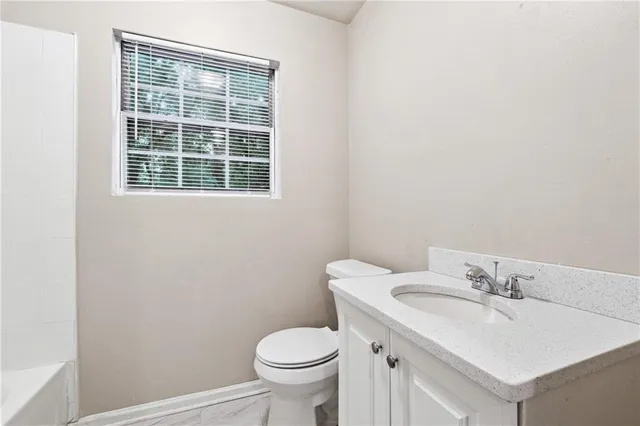 a bathroom with a bathtub