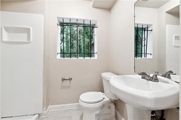 a view of balcony with wooden floor