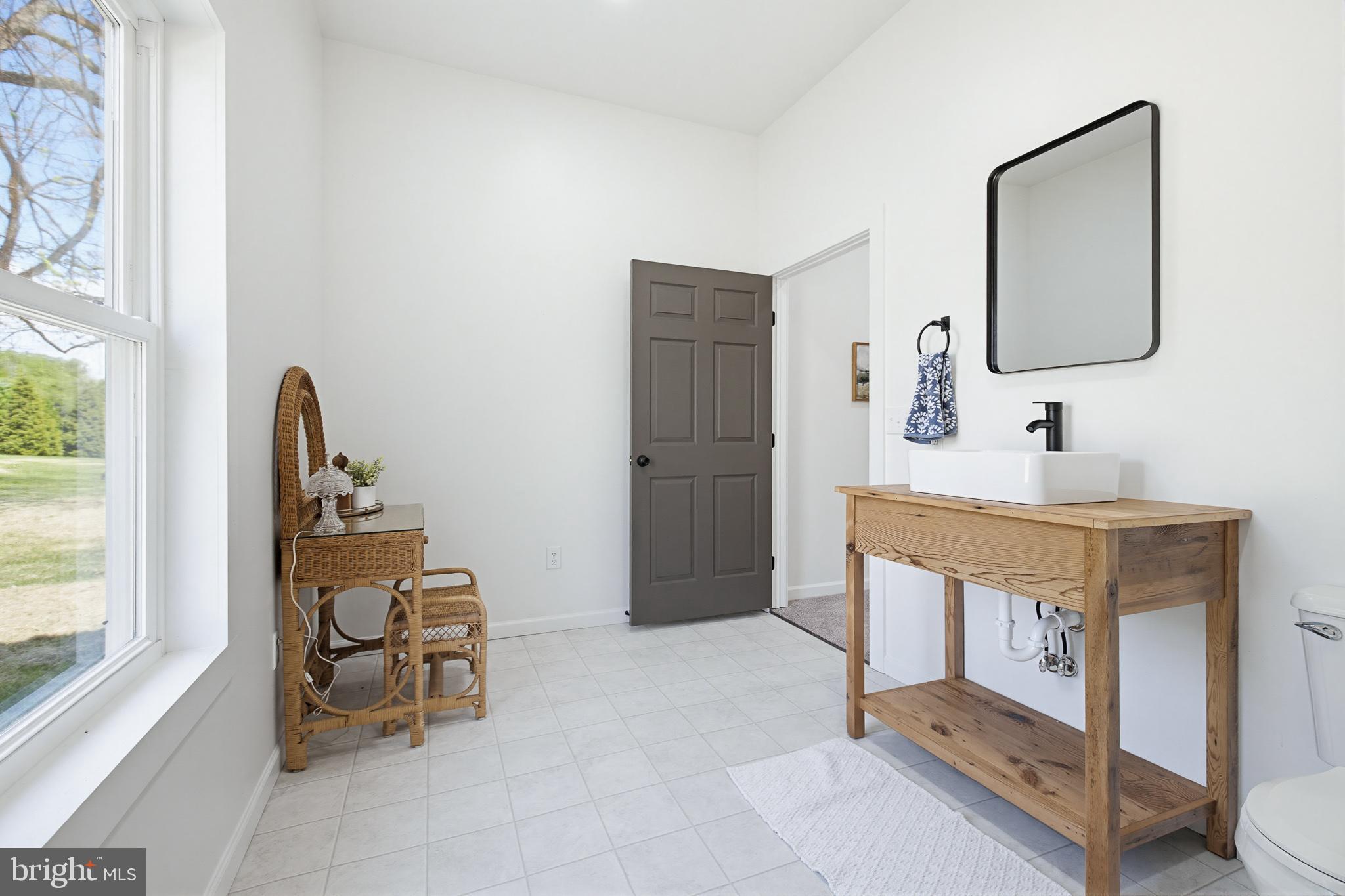 112 Sawmill Road Elizabethtown, PA 17022 - Photo 25 of 56 a bedroom with a bed and a mirror