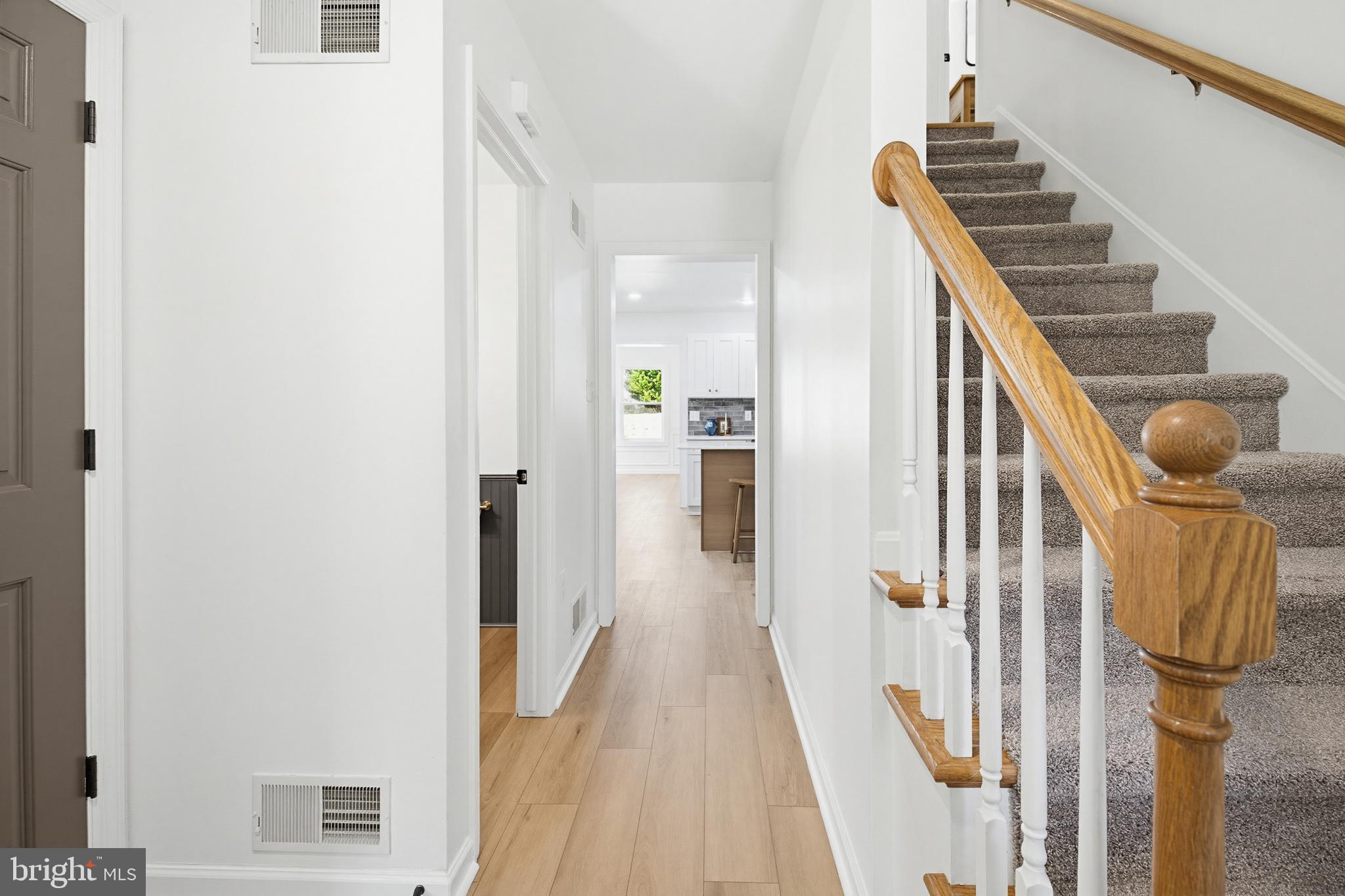 112 Sawmill Road Elizabethtown, PA 17022 - Photo 30 of 56 a view of a hallway with wooden floor and staircase