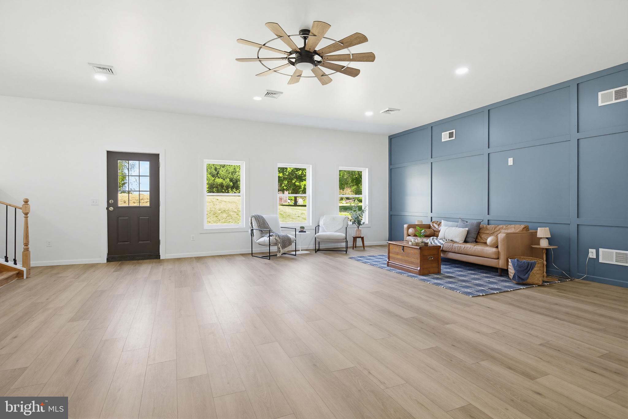 112 Sawmill Road Elizabethtown, PA 17022 - Photo 3 of 56 a view of a livingroom with furniture and a ceiling fan