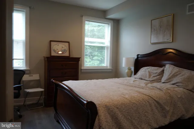 a view of fireplace with wooden floor