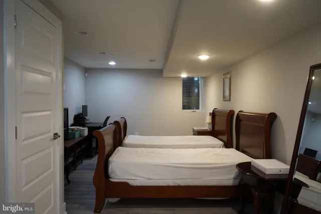 a kitchen with stainless steel appliances granite countertop a refrigerator sink and stove