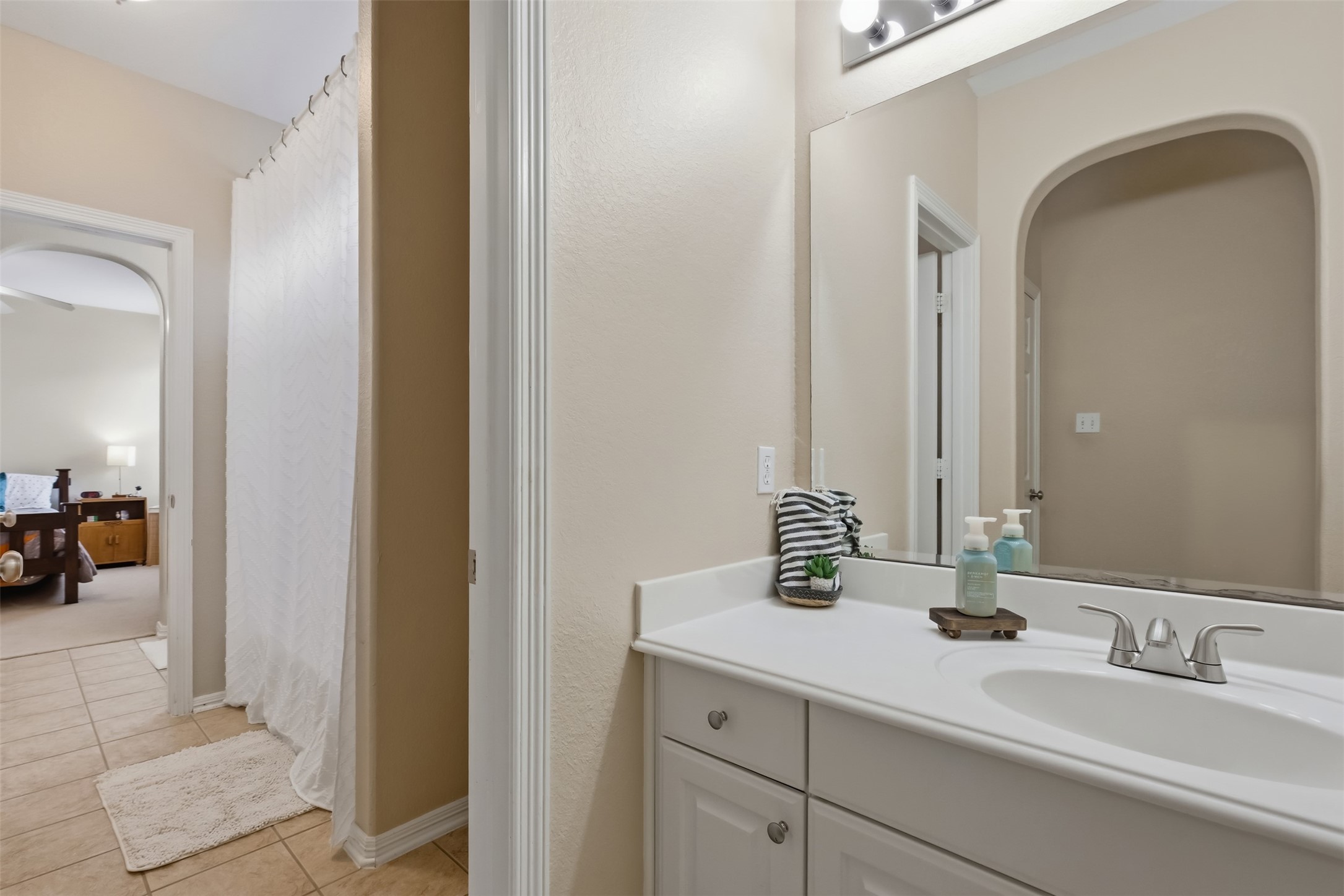 20722 Windrose Bend Drive Spring, TX 77379 - Photo 29 of 50 This photo showcases the view from the vanity on the other side of the Jack & Jill bath.