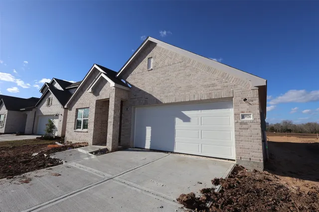 a view of a livingroom with furniture and a flat screen tv