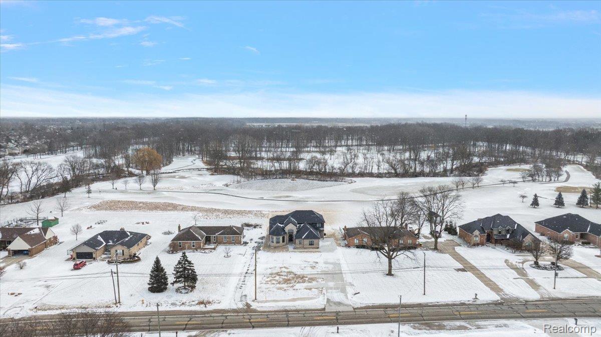 53650 Romeo Plank Road Macomb, MI 48042 - Photo 58 of 64 View of snowy aerial view