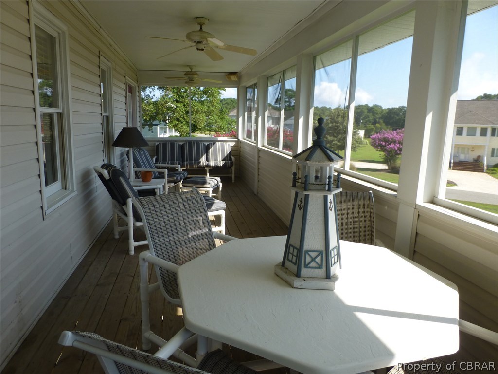 464 Jackson Creek Road Deltaville, VA 23043 - Photo 5 of 26 Screen porch with lots of room and great views