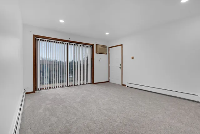 a view of a livingroom with a staircase