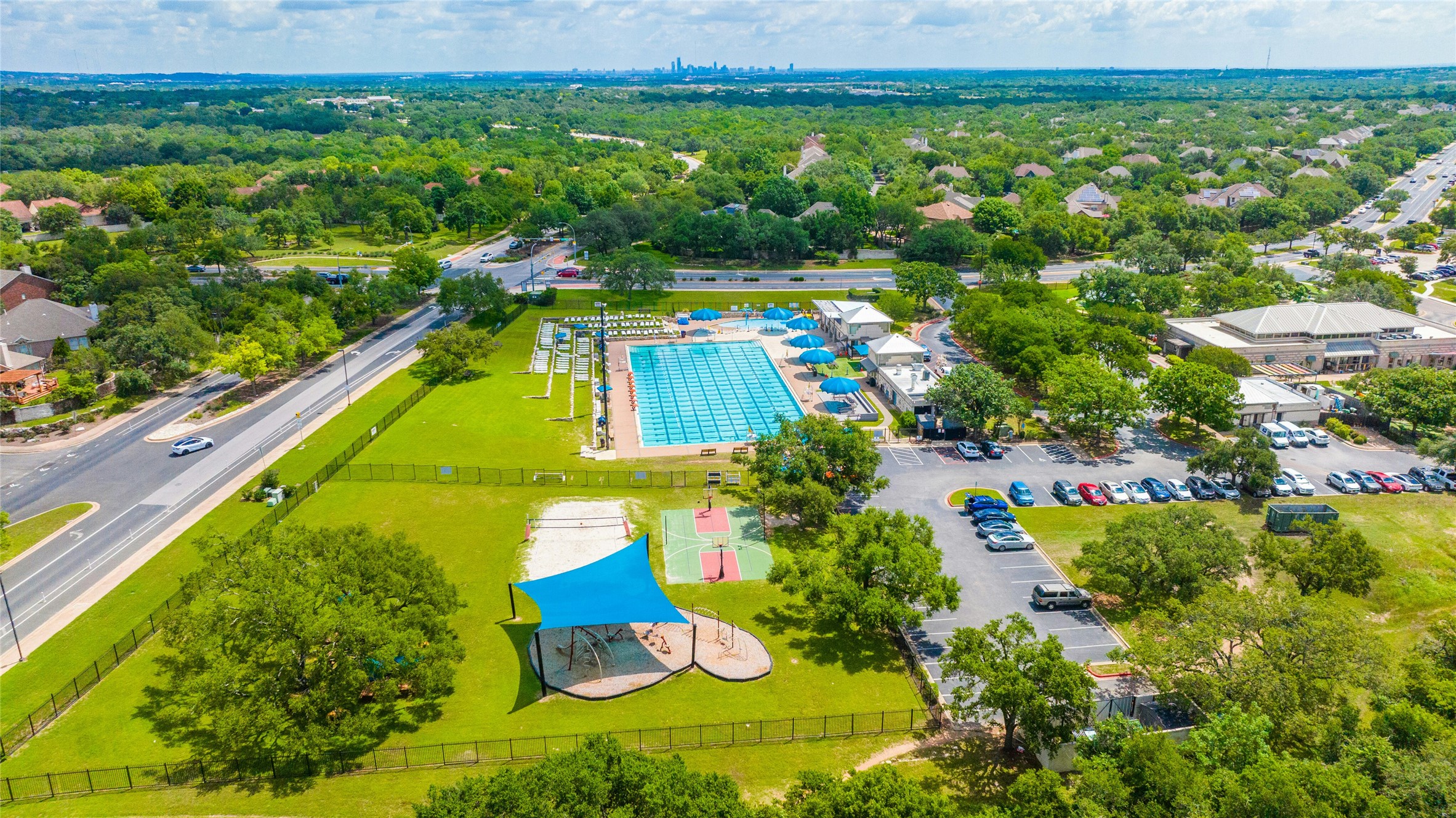 10902 Beacham Court Austin, TX 78739 - Photo 27 of 32 Circle C Swim Center Olympic Sized Lap Pool, Playground and Sports Court Complex at the corner of Escarpment and LaCrosse