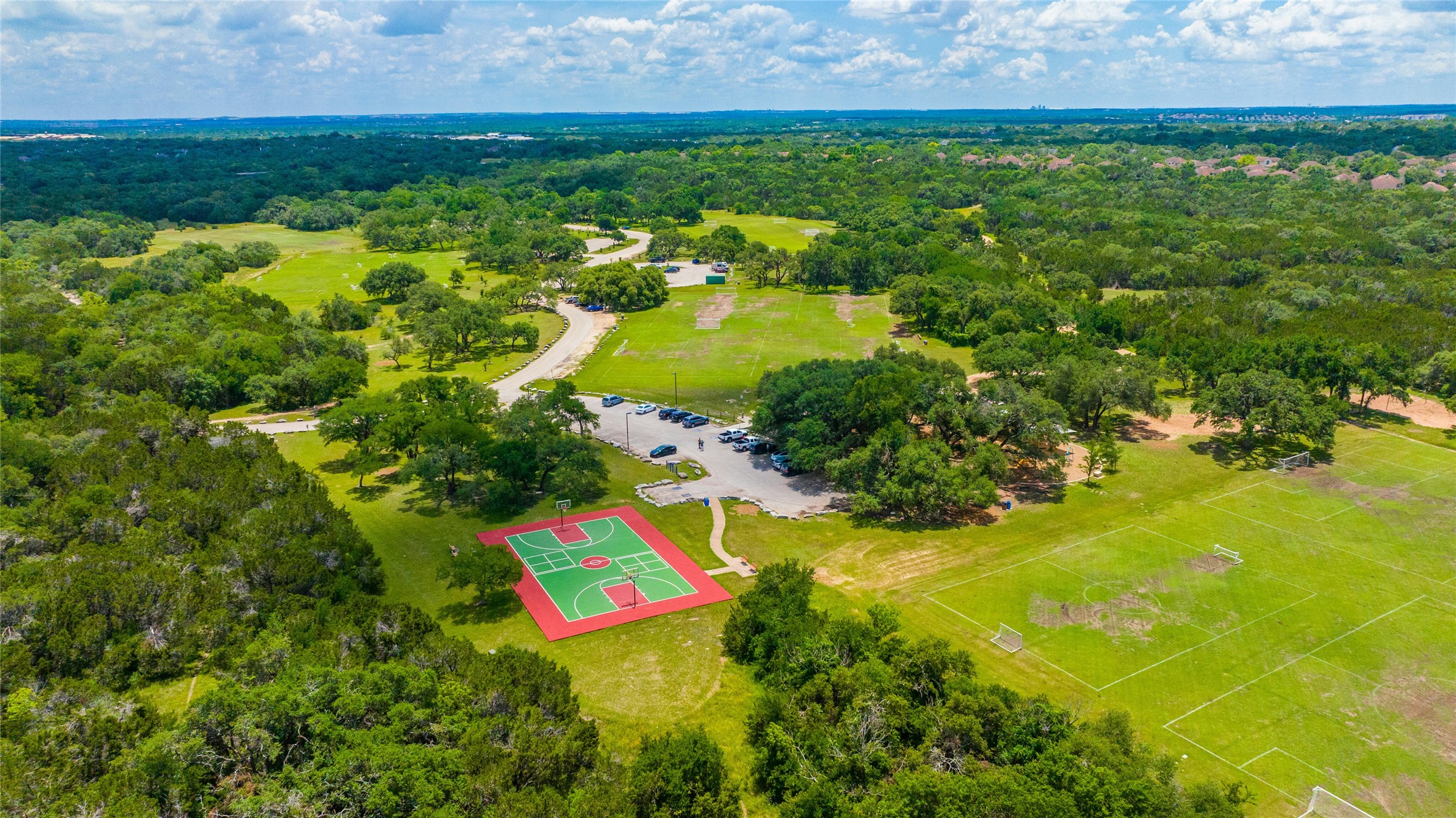 10902 Beacham Court Austin, TX 78739 - Photo 30 of 32 Circle C Slaughter Metro Park on Slaughter Lane west of Escarpment Blvd with soccer and disc golf fields, basket ball court, shaded playground/playscape