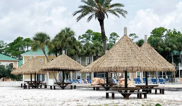 a view of a kitchen with a table and chairs