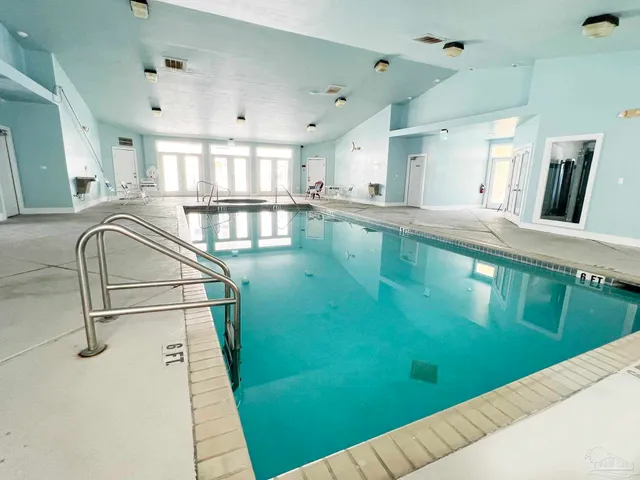 a view of a living room and bathroom