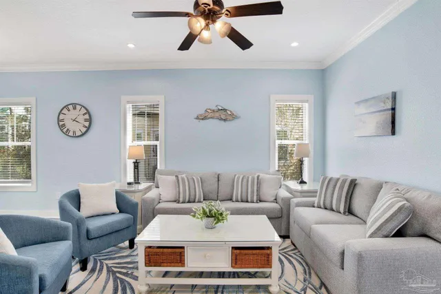 a living room with furniture and a window