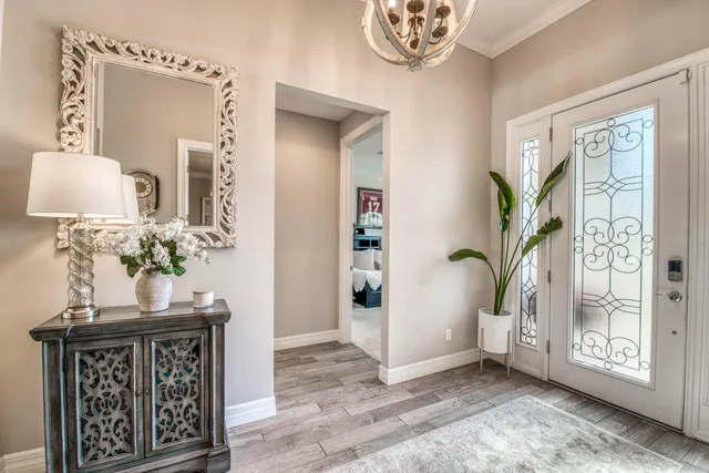 a bathroom with a granite countertop sink a toilet and a mirror