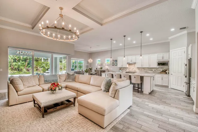 a bathroom with a granite countertop sink a toilet and a mirror