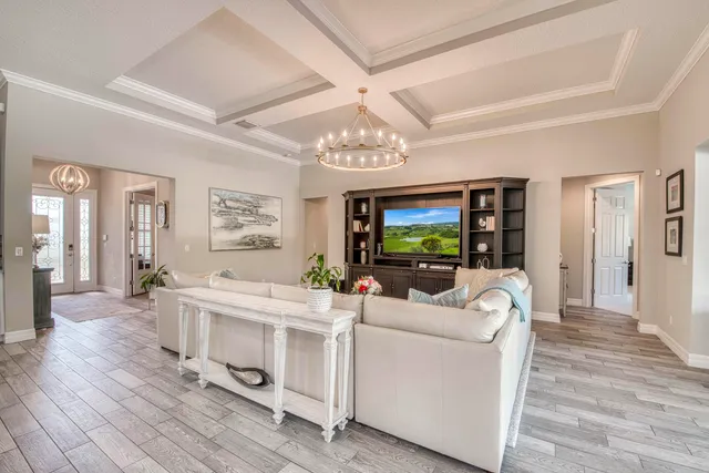 an aerial view of a house with a garden and plants