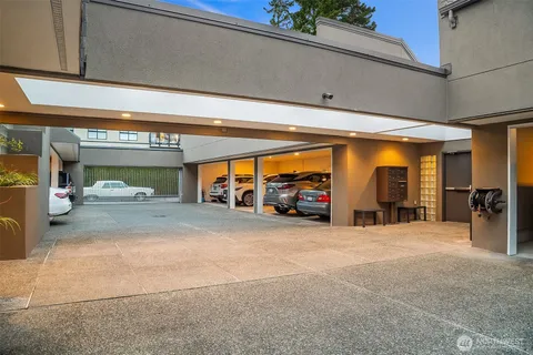 a front view of multiple houses with swimming pool
