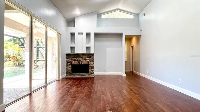 a kitchen with stainless steel appliances a sink and a refrigerator