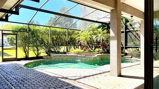 a view of a house with backyard