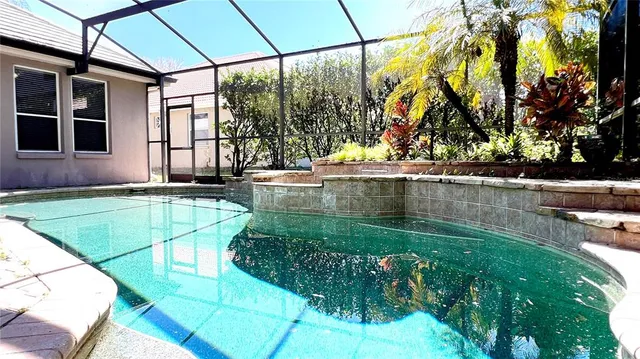 a view of yellow house with a outdoor space