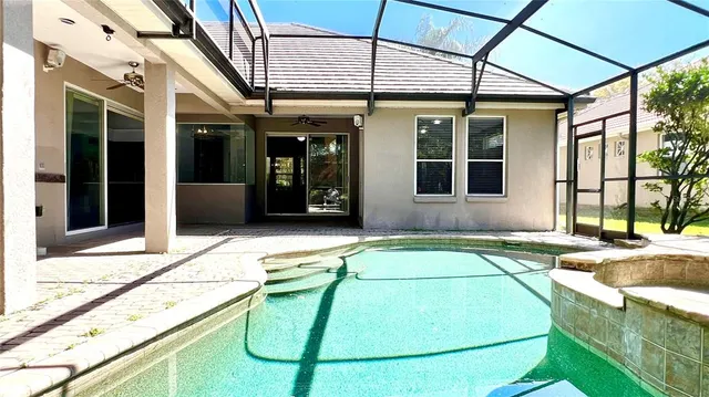 a view of a swimming pool and window