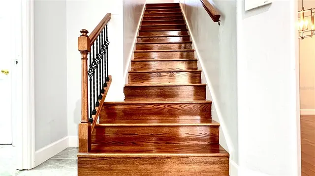 a bathroom with a toilet and shower