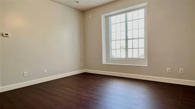 an aerial view of house with yard