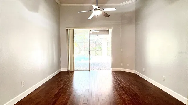 a view of an entryway with wooden floors