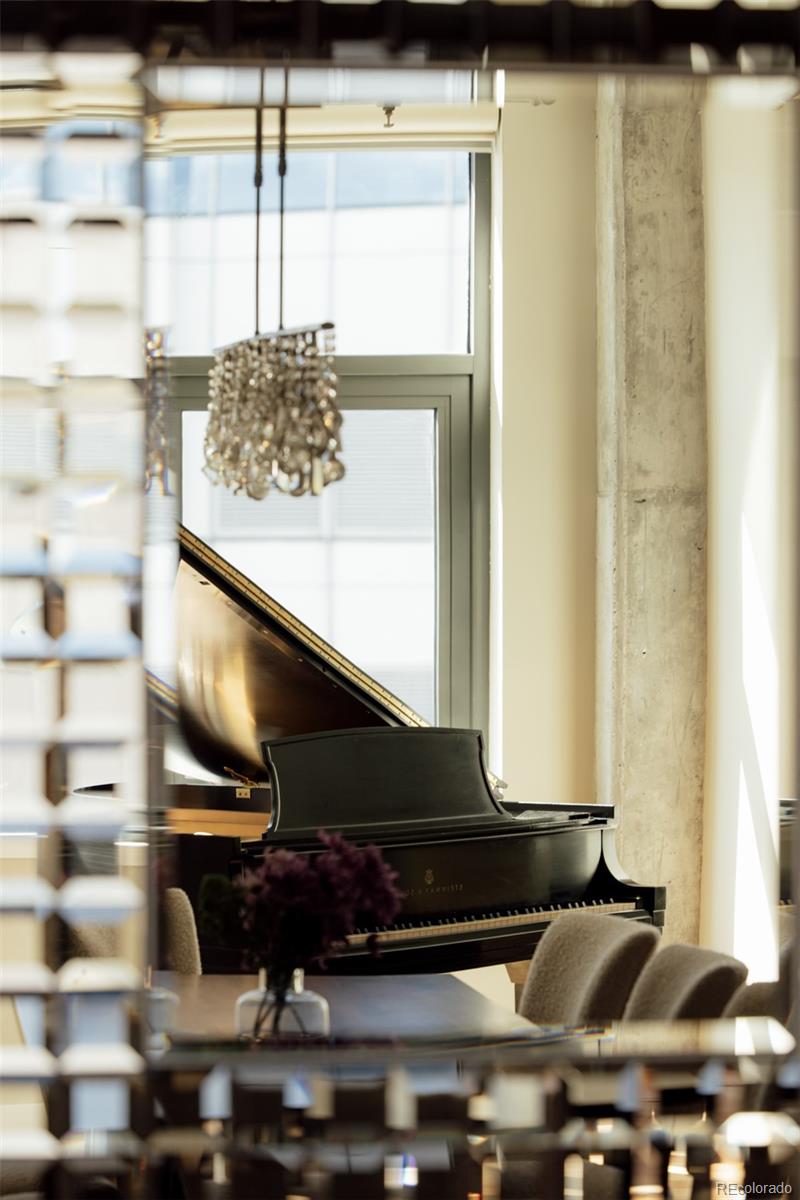 2100 16th St Mall, Unit 607 Denver, CO 80202 - Photo 14 of 46 a table with wine cabinets and outdoor space