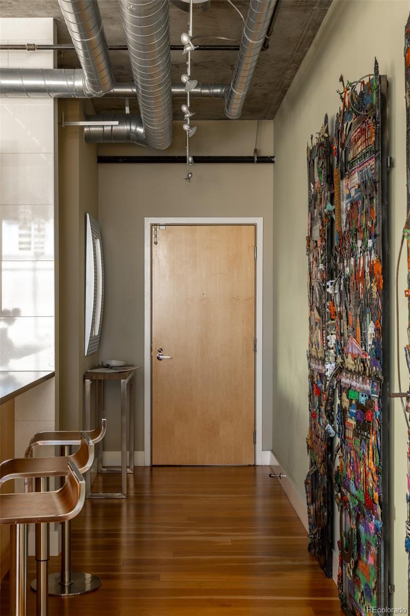 2100 16th St Mall, Unit 607 Denver, CO 80202 - Photo 22 of 46 a view of a entryway with wooden floor