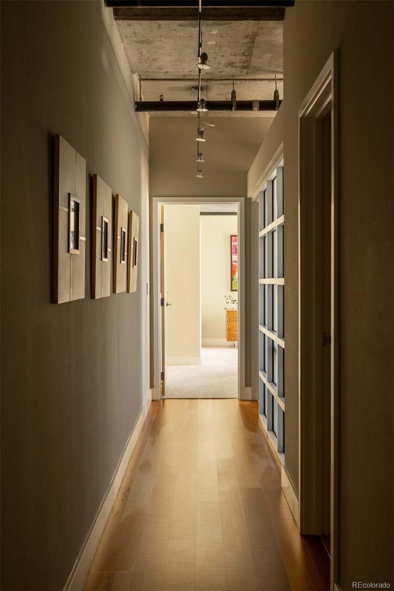 2100 16th St Mall, Unit 607 Denver, CO 80202 - Photo 24 of 46 a view of a hallway with a window