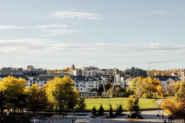 a view of a car park in front of a building