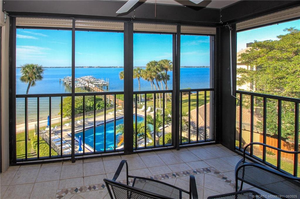 4540 Northeast Sandpebble Trace, Unit 406 Stuart, FL 34996 - Photo 1 of 36 a view of a large window with an outdoor view
