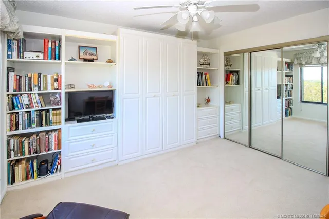 a view of a livingroom with a bookshelf